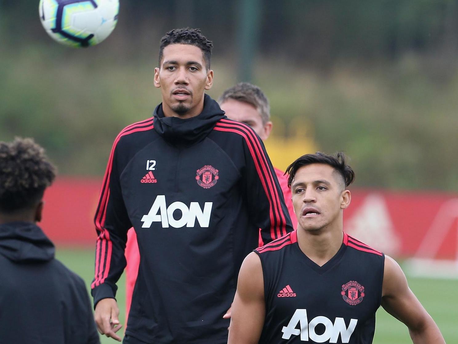 alexis-sanchez-chris-smalling